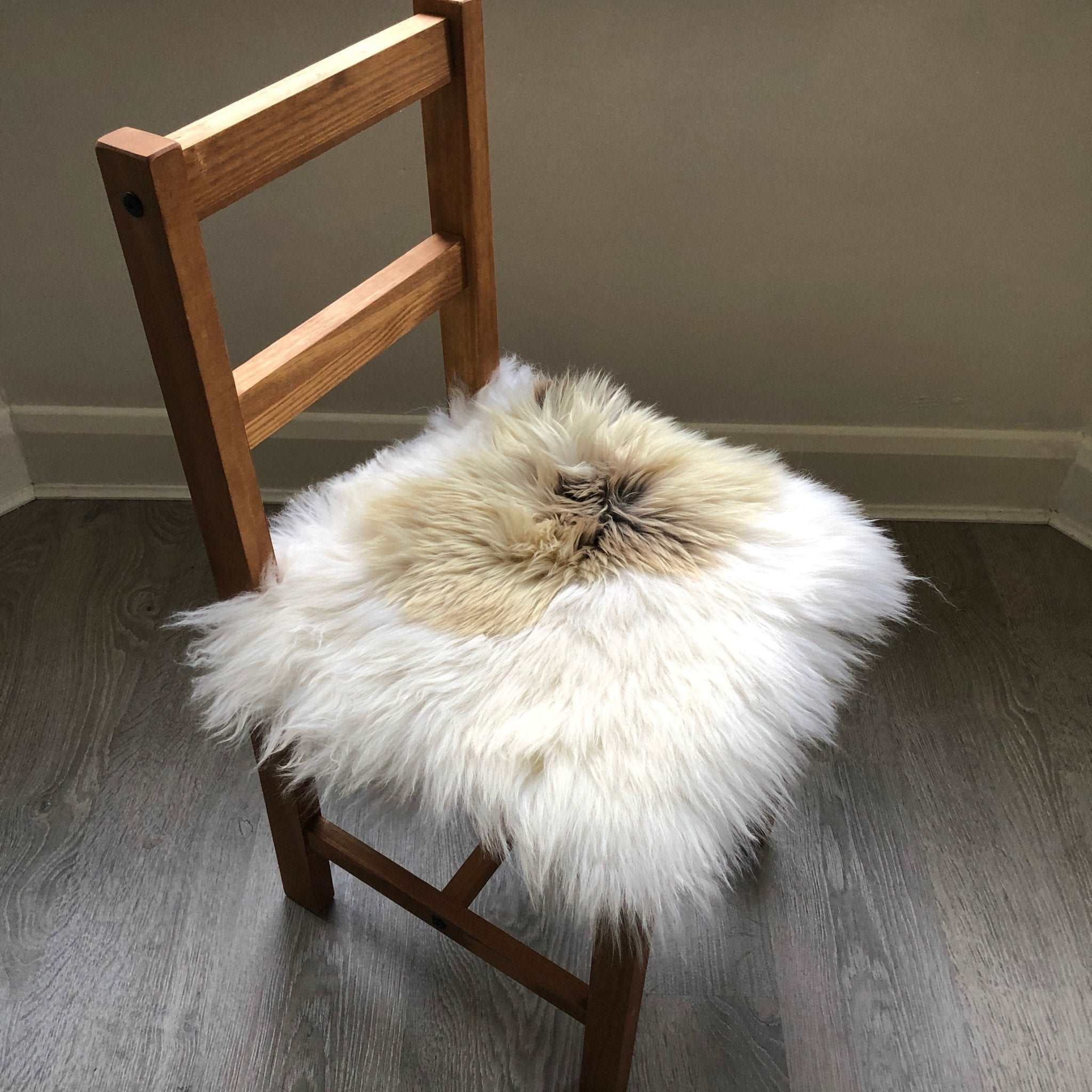 Faux sheepskin seat clearance pad