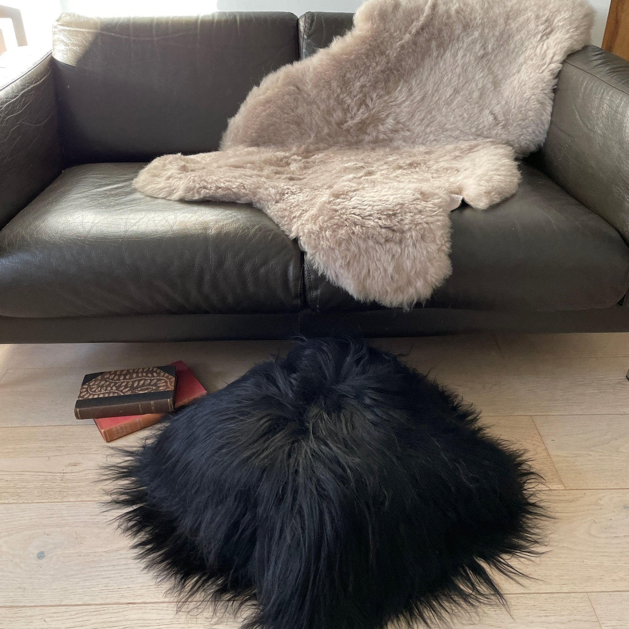 Black sheepskin outlet cushion