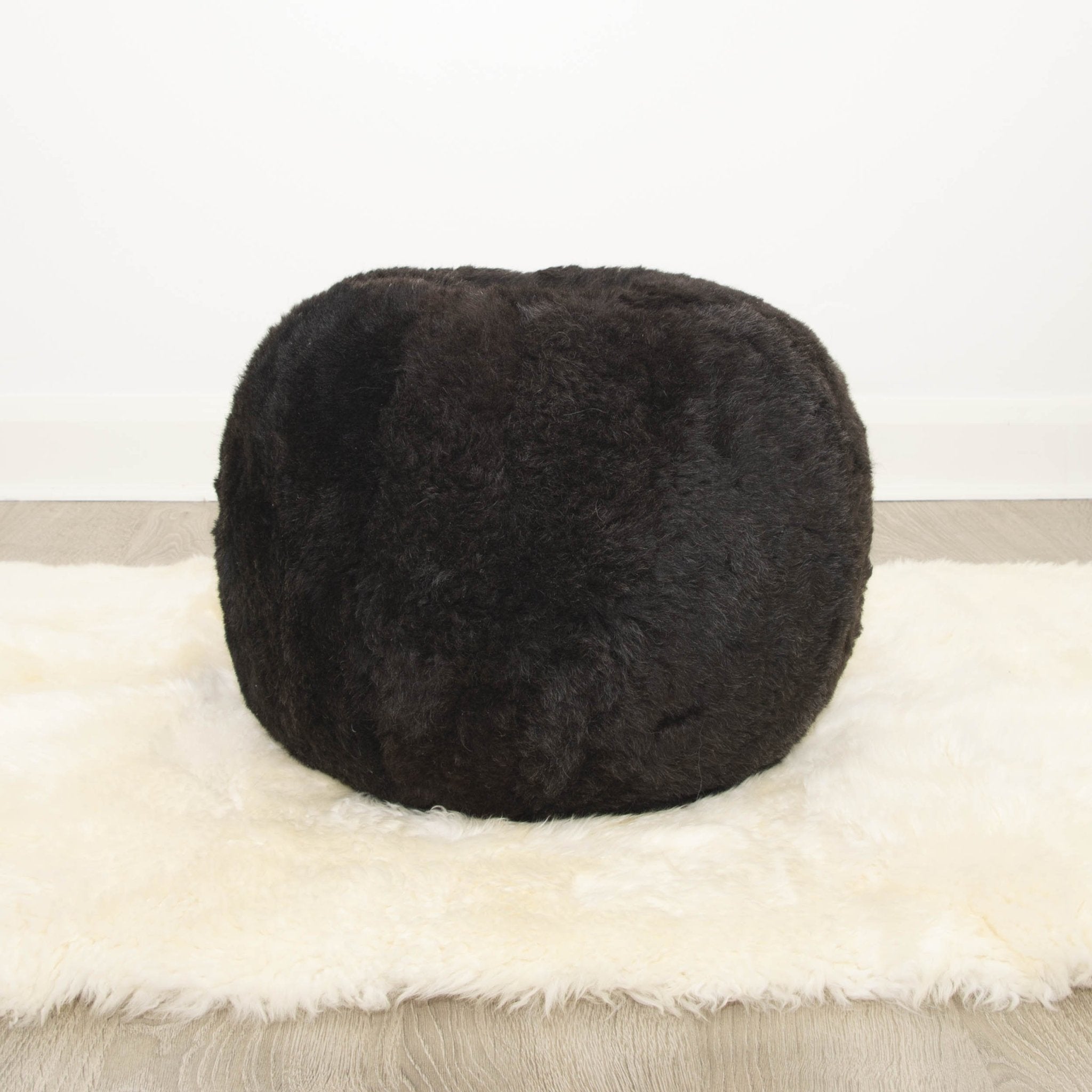 Round deals fluffy ottoman